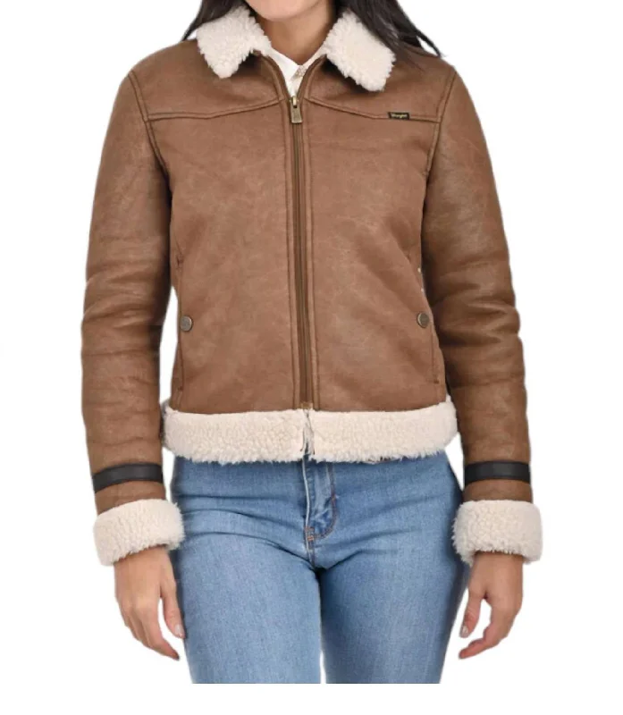 ladies' quilted coat -Ladies Coat With Sheepskin On Collar And Cuffs In Capuccino